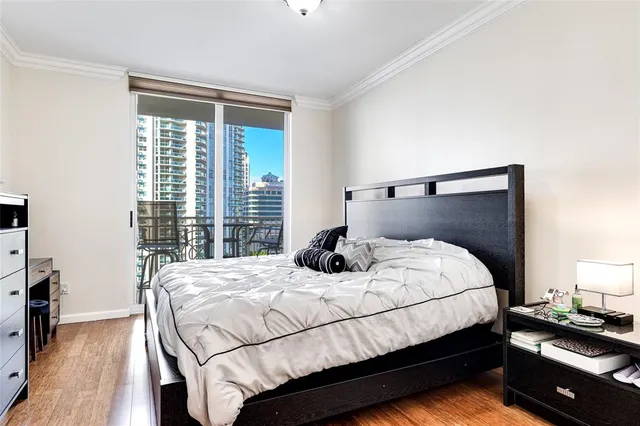 a bedroom with a bed and a closet