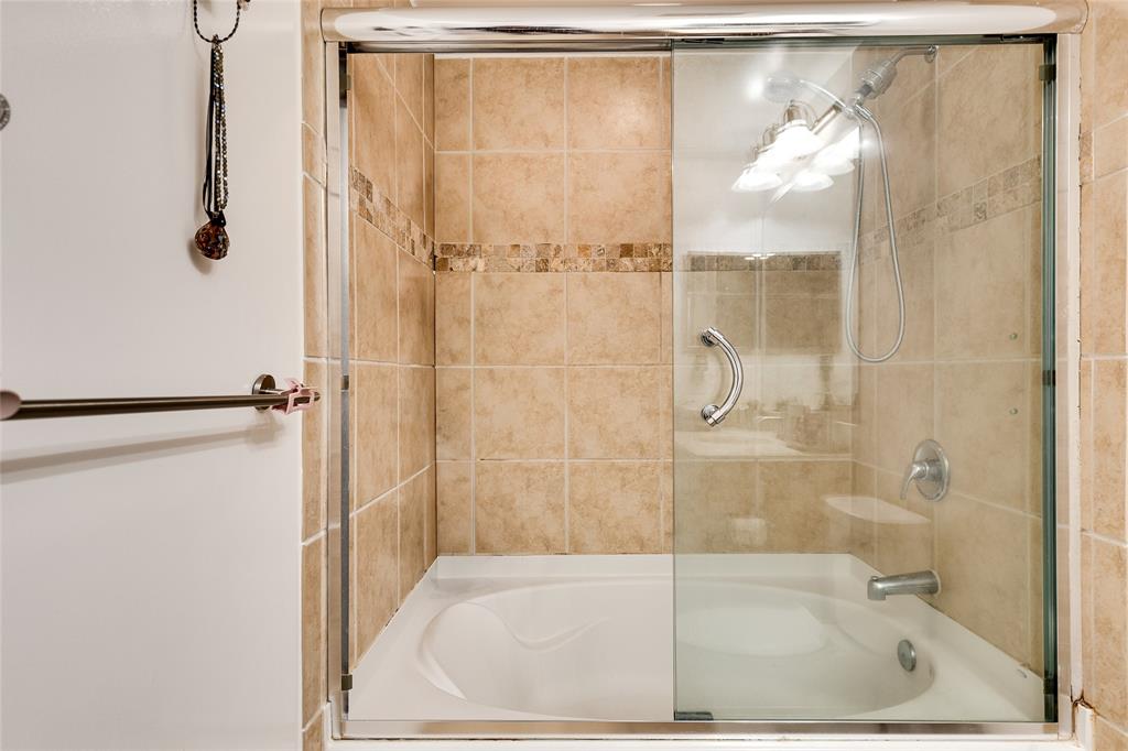 511 Southeast 5th Avenue, Unit 1022 Fort Lauderdale, FL 33301 - Photo 16 of 67 a bathroom with a glass shower door