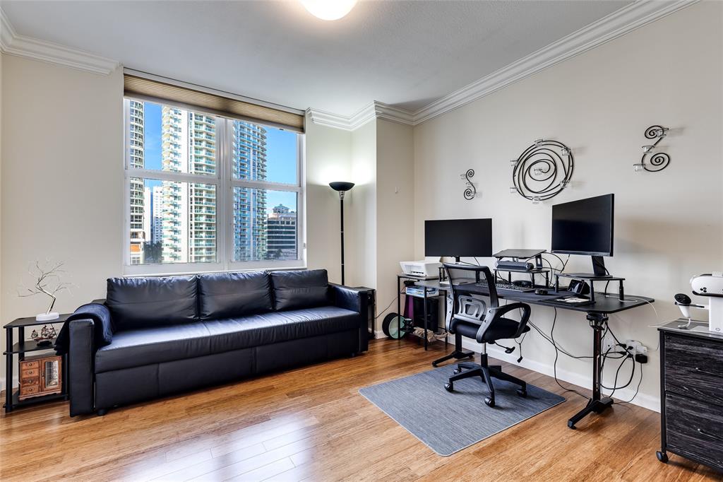 511 Southeast 5th Avenue, Unit 1022 Fort Lauderdale, FL 33301 - Photo 21 of 67 a view of a livingroom with workspace and a couch