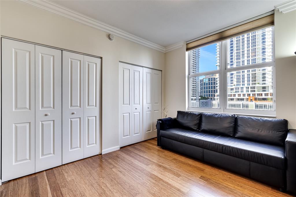 511 Southeast 5th Avenue, Unit 1022 Fort Lauderdale, FL 33301 - Photo 22 of 67 a living room with furniture and large windows