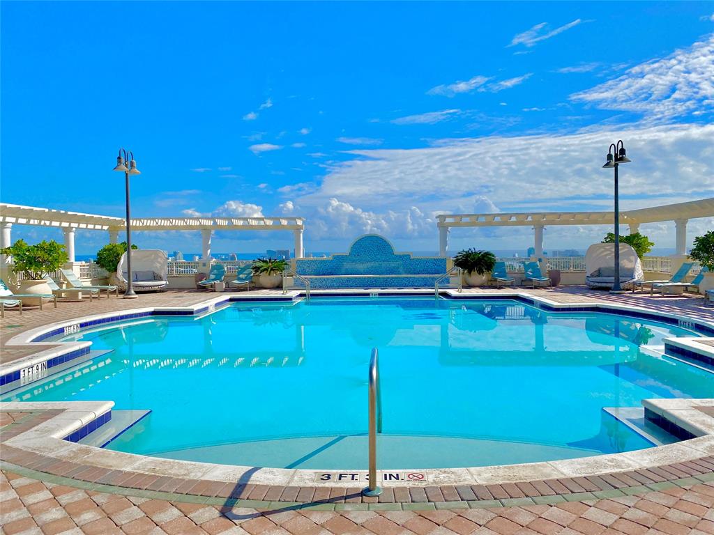 511 Southeast 5th Avenue, Unit 1022 Fort Lauderdale, FL 33301 - Photo 31 of 67 a view of a swimming pool with a patio