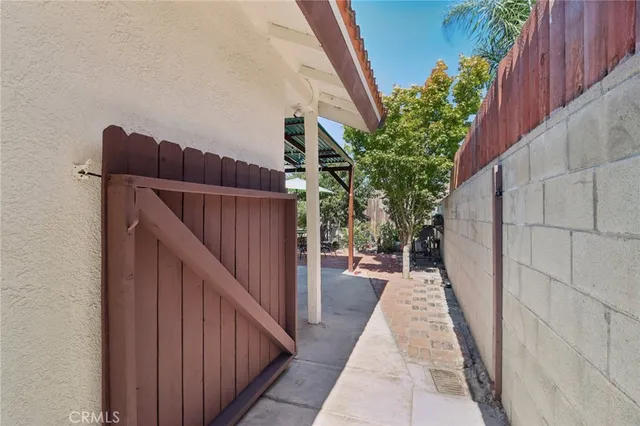 a path view of balcony with wooden floor