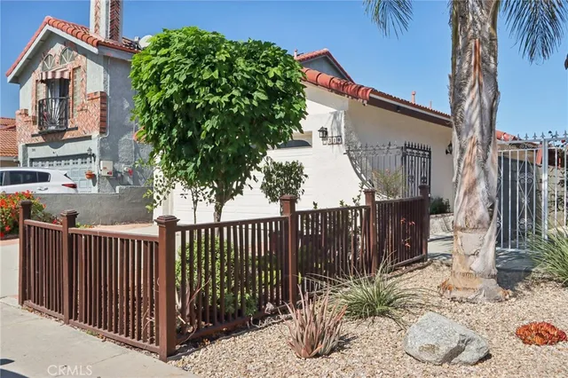 a house view with a garden space