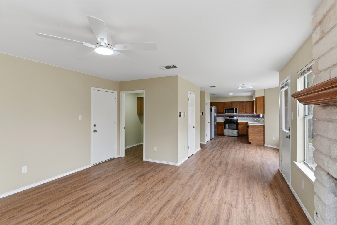 3900 Lemos Drive Austin, TX 78728 - Photo 11 of 35 a view of a livingroom with a furniture wooden floor and staircase