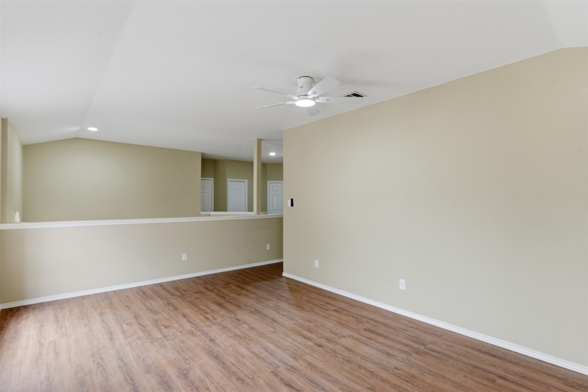 3900 Lemos Drive Austin, TX 78728 - Photo 16 of 35 wooden floor in an empty room with a window