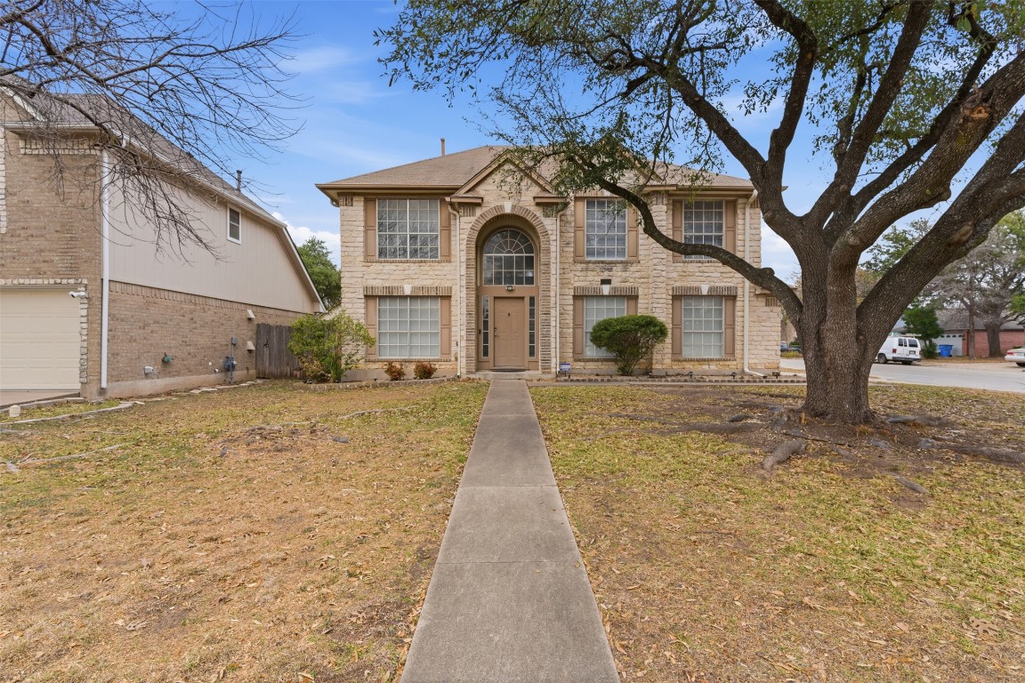 3900 Lemos Drive Austin, TX 78728 - Photo 2 of 35 a front view of a house with large trees