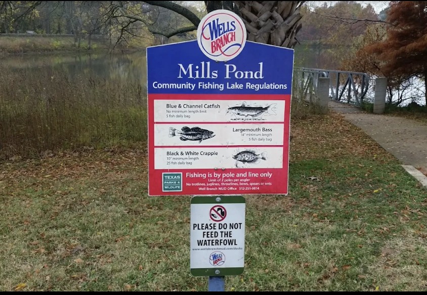 3900 Lemos Drive Austin, TX 78728 - Photo 29 of 35 a sign on red brick wall