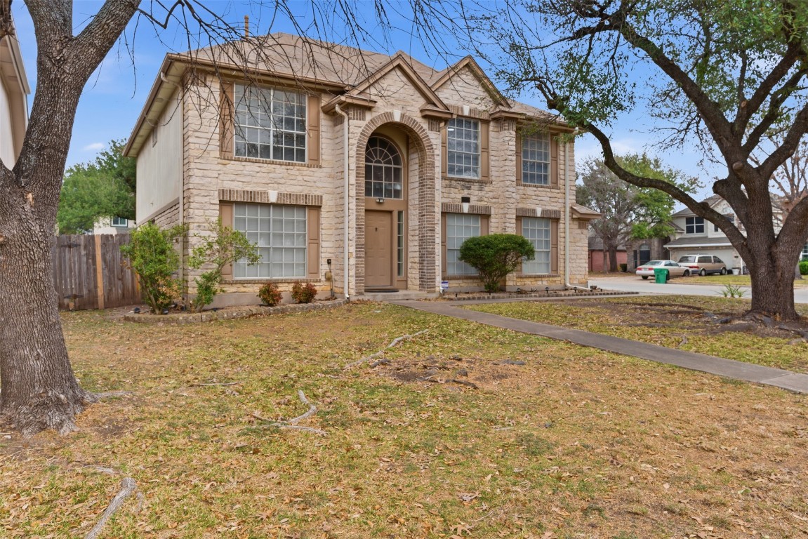 3900 Lemos Drive Austin, TX 78728 - Photo 3 of 35 a front view of a house with a yard