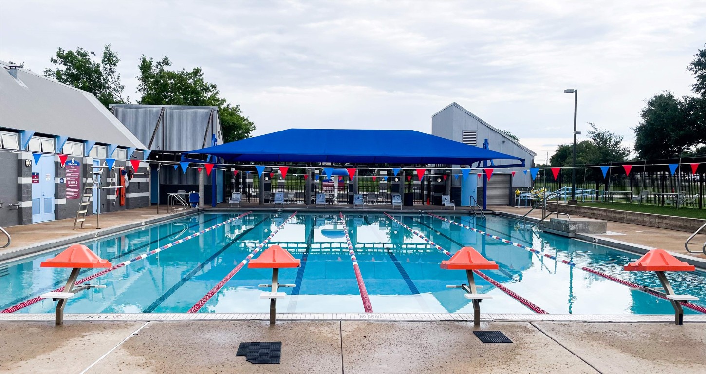 3900 Lemos Drive Austin, TX 78728 - Photo 32 of 35 a group of people sitting outside of a park