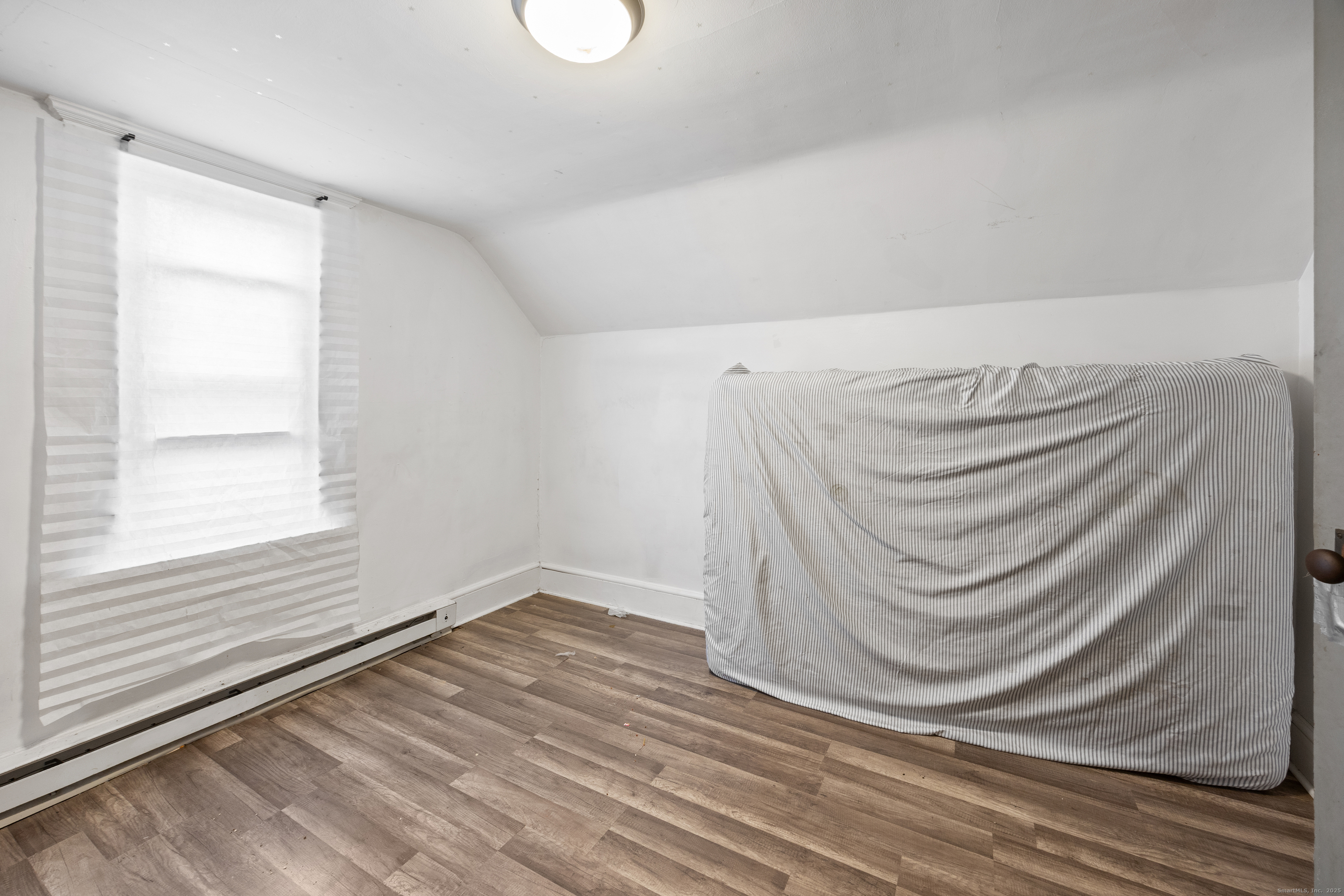 29 Berry Street Torrington, CT 06790 - Photo 21 of 31 a bathroom with a sink and a window