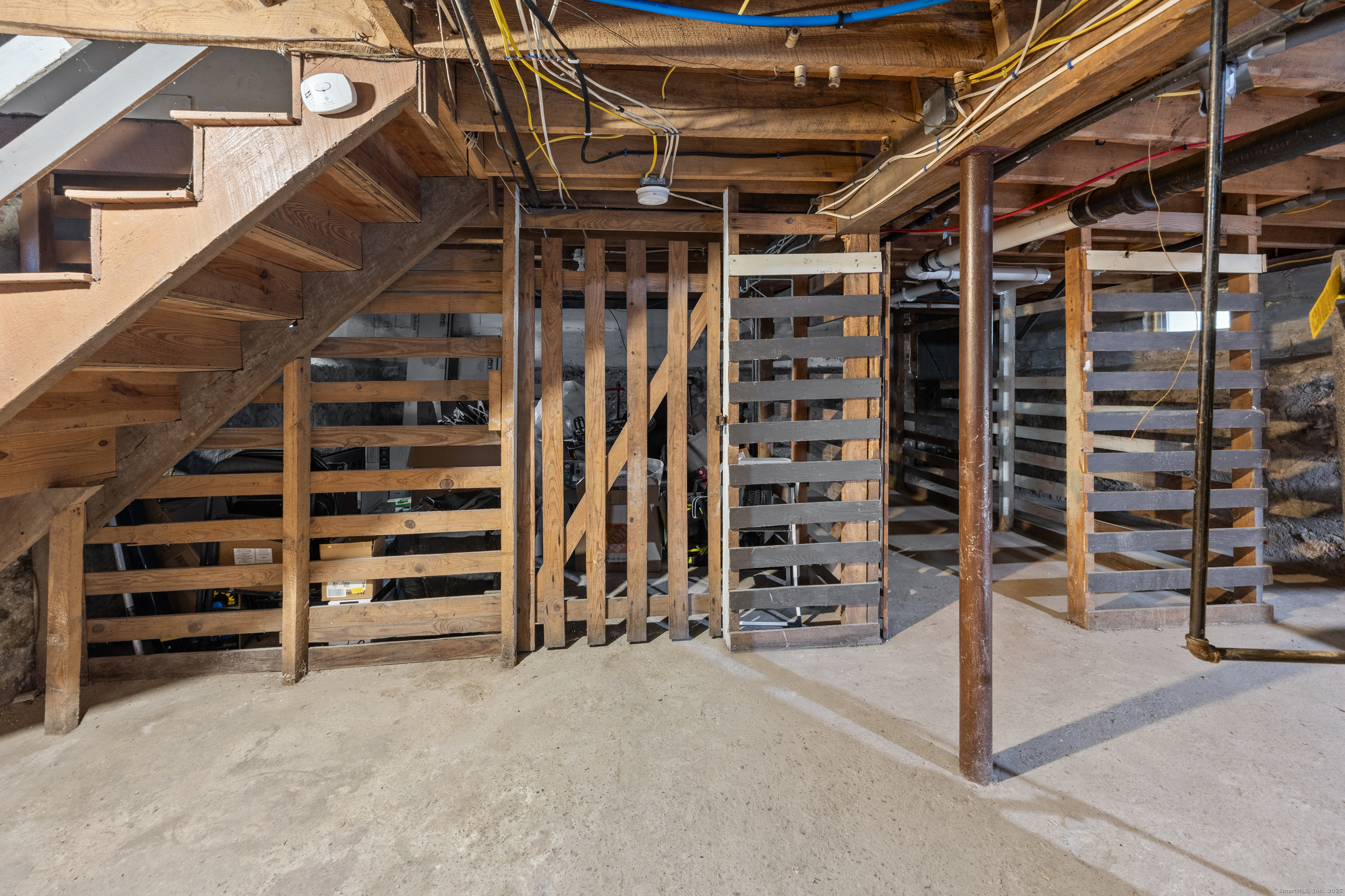 29 Berry Street Torrington, CT 06790 - Photo 24 of 31 a view of an empty room with stairs