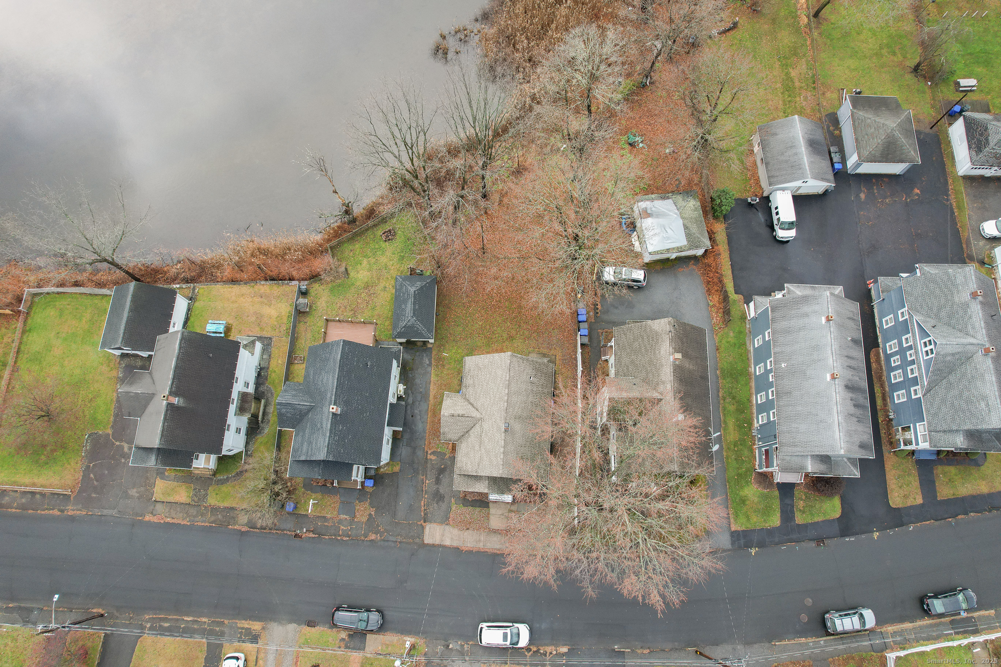 29 Berry Street Torrington, CT 06790 - Photo 31 of 31 a aerial view of multi story residential apartment building with yard
