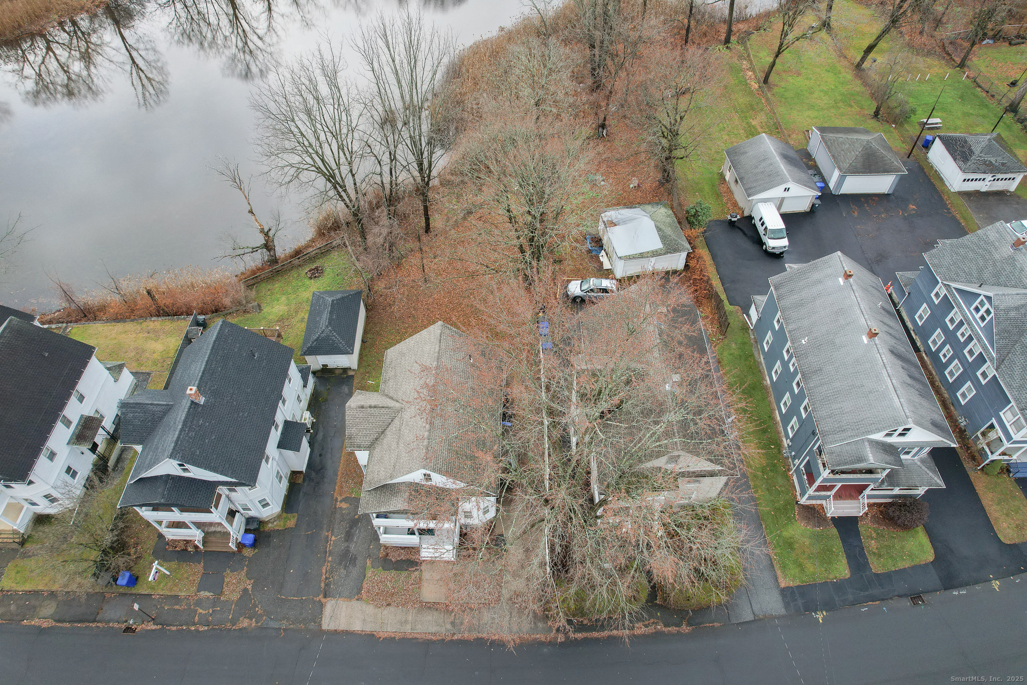 29 Berry Street Torrington, CT 06790 - Photo 4 of 31 an aerial view of a house with outdoor space