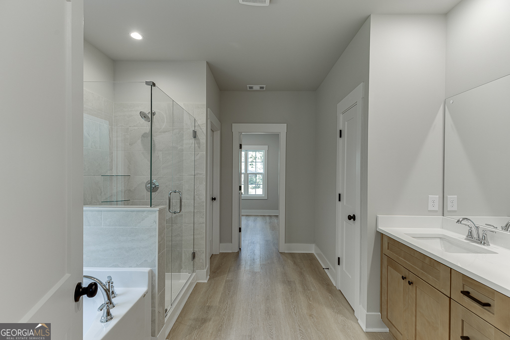 110 Rains Road Jefferson, GA 30549 - Photo 24 of 43 a bathroom with a sink a toilet and shower