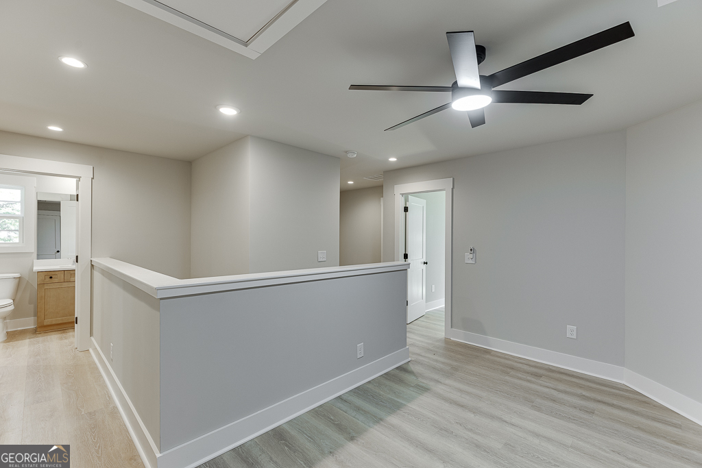 110 Rains Road Jefferson, GA 30549 - Photo 29 of 43 a view of an empty room with wooden floor
