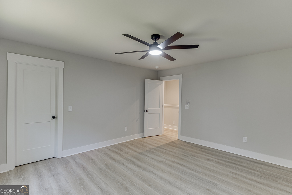 110 Rains Road Jefferson, GA 30549 - Photo 31 of 43 a view of empty room with wooden floor
