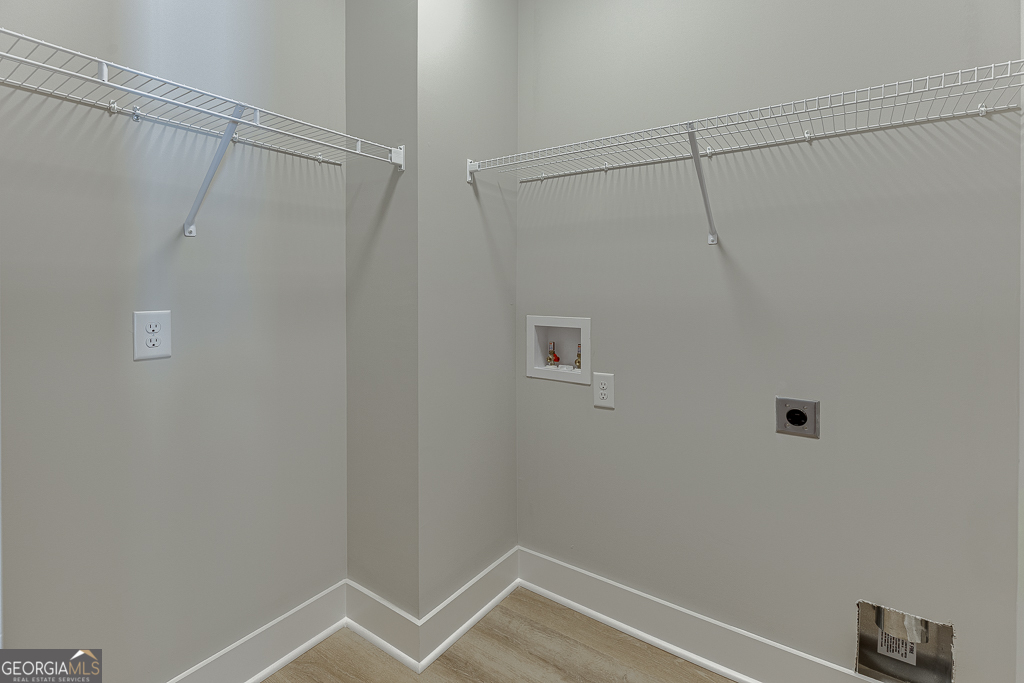 110 Rains Road Jefferson, GA 30549 - Photo 6 of 43 a view of a room with racks on the wall