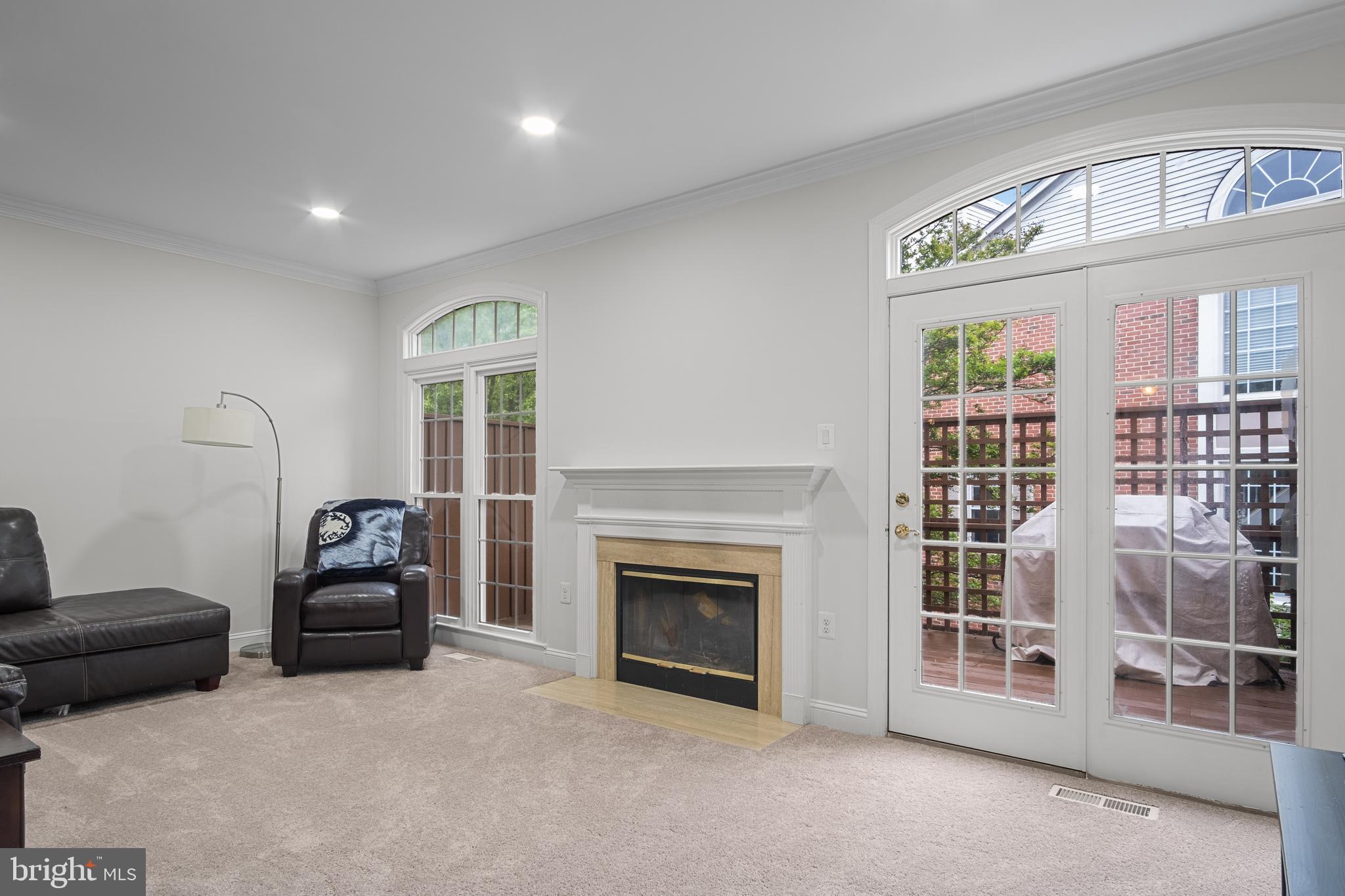 6532 Milva Lane Springfield, VA 22150 - Photo 19 of 57 Cozy Wood-Burning Fireplace - French Door to Deck