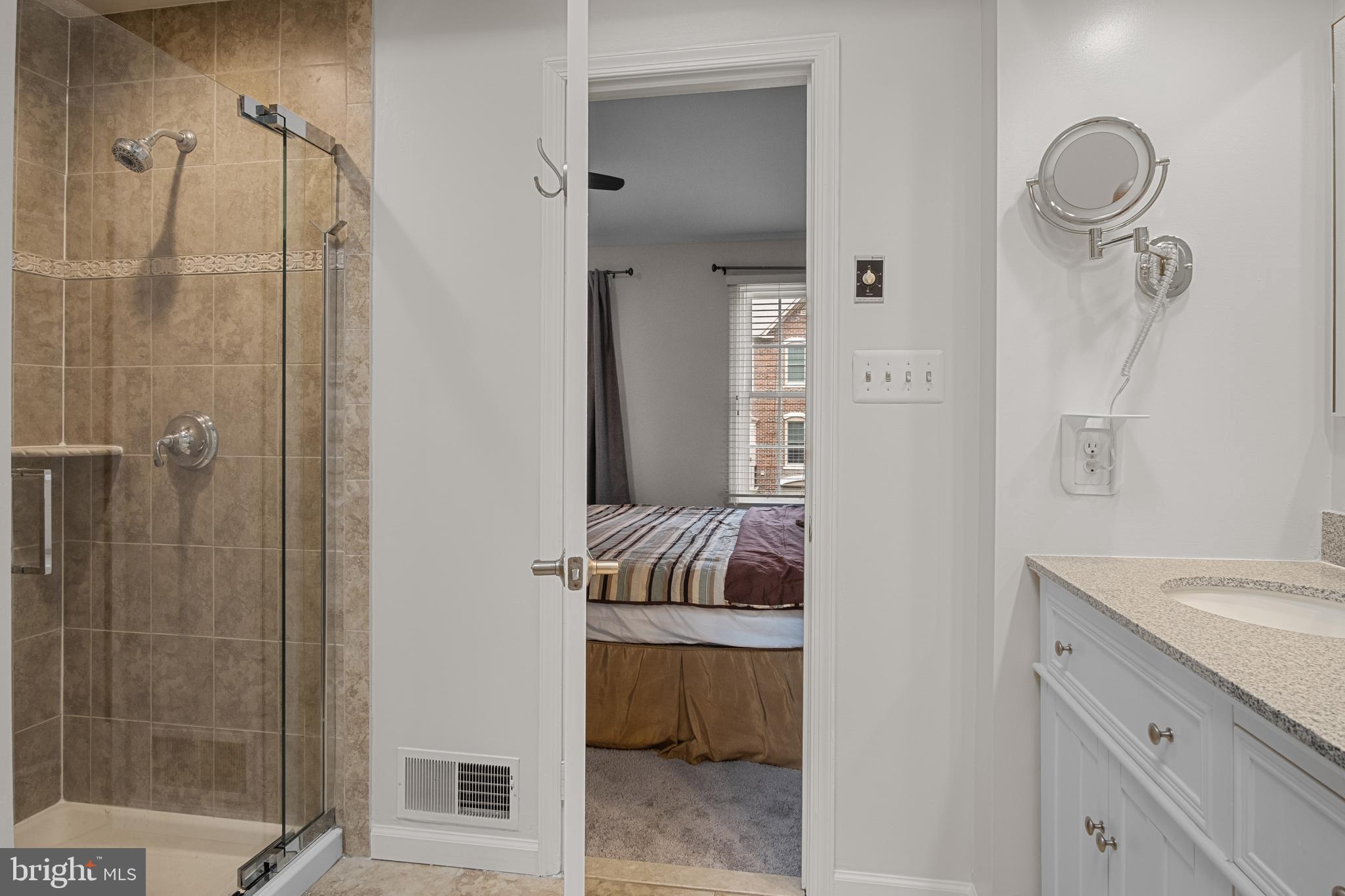 6532 Milva Lane Springfield, VA 22150 - Photo 38 of 57 Enter the Private Bath; Frameless Glass Shower