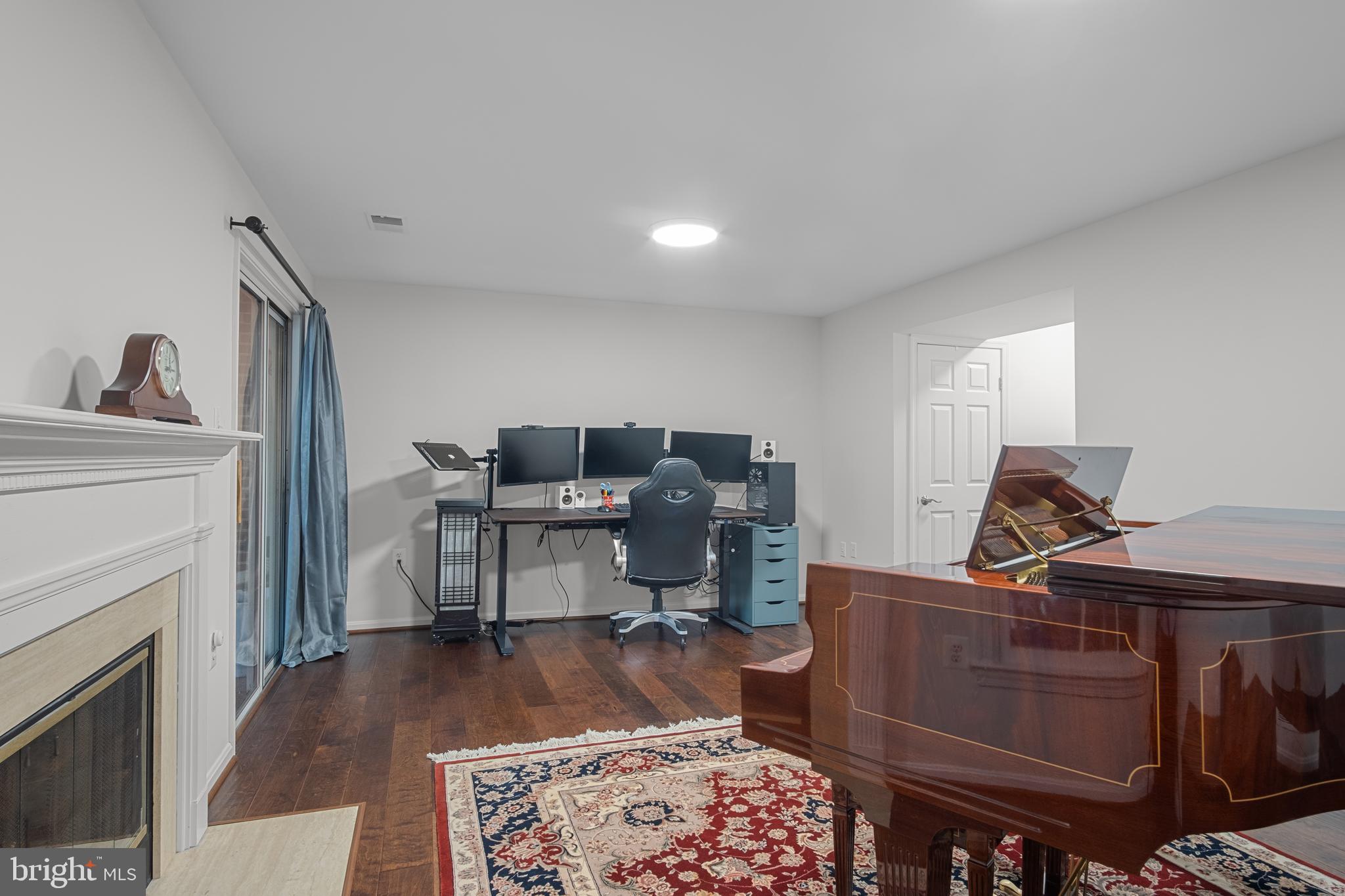 6532 Milva Lane Springfield, VA 22150 - Photo 49 of 57 Large Family Room (Yes, the Piano is THAT Big)