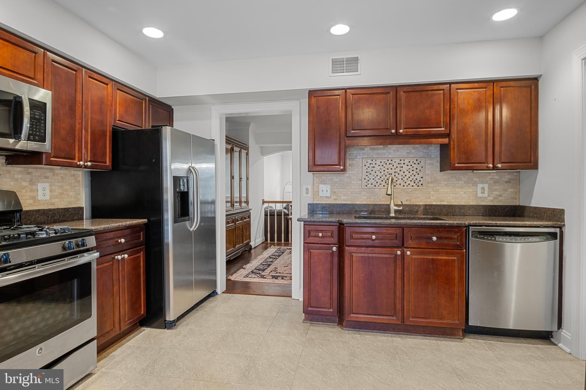 6532 Milva Lane Springfield, VA 22150 - Photo 10 of 57 Plenty of Cabinet Space - Entry to DR