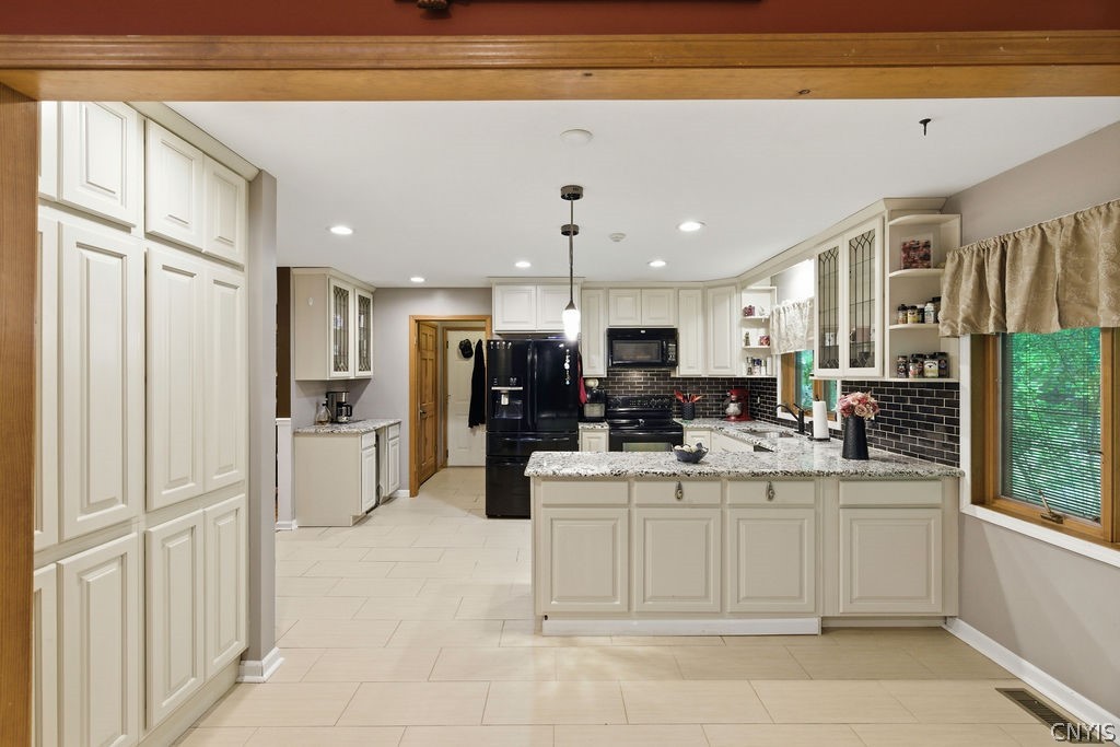 1000 Rail Fence Road Camillus, NY 13031 - Photo 7 of 37 NOTICE THE WALL OF STORAGE CABINETRY!