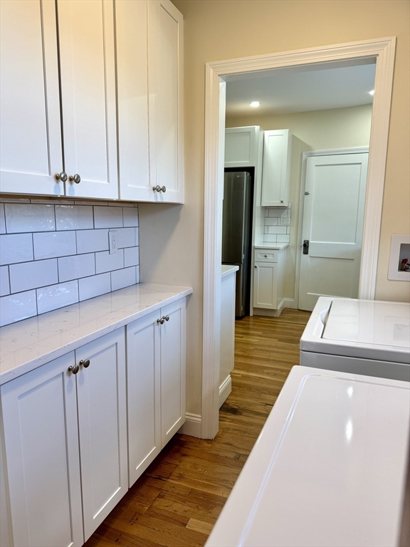 57 Winthrop Road, Unit 2 Everett, MA 02149 - Photo 4 of 15 a bathroom with a sink and a mirror