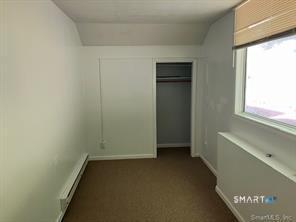 10 Old Waterbury Road, Unit 3 Middlebury, CT 06762 - Photo 5 of 7 a view of hallway with window