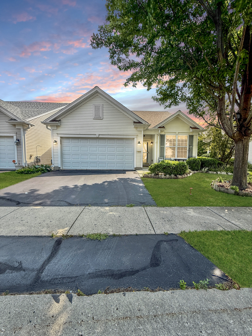 13455 Nealy Road Huntley, IL 60142 - Photo 1 of 16 a view of a house with a yard