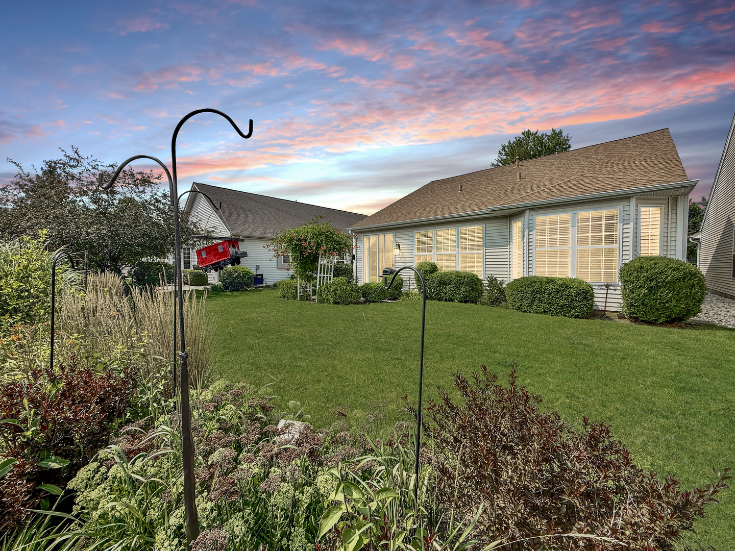 13455 Nealy Road Huntley, IL 60142 - Photo 2 of 16 a backyard of a house with table and chairs