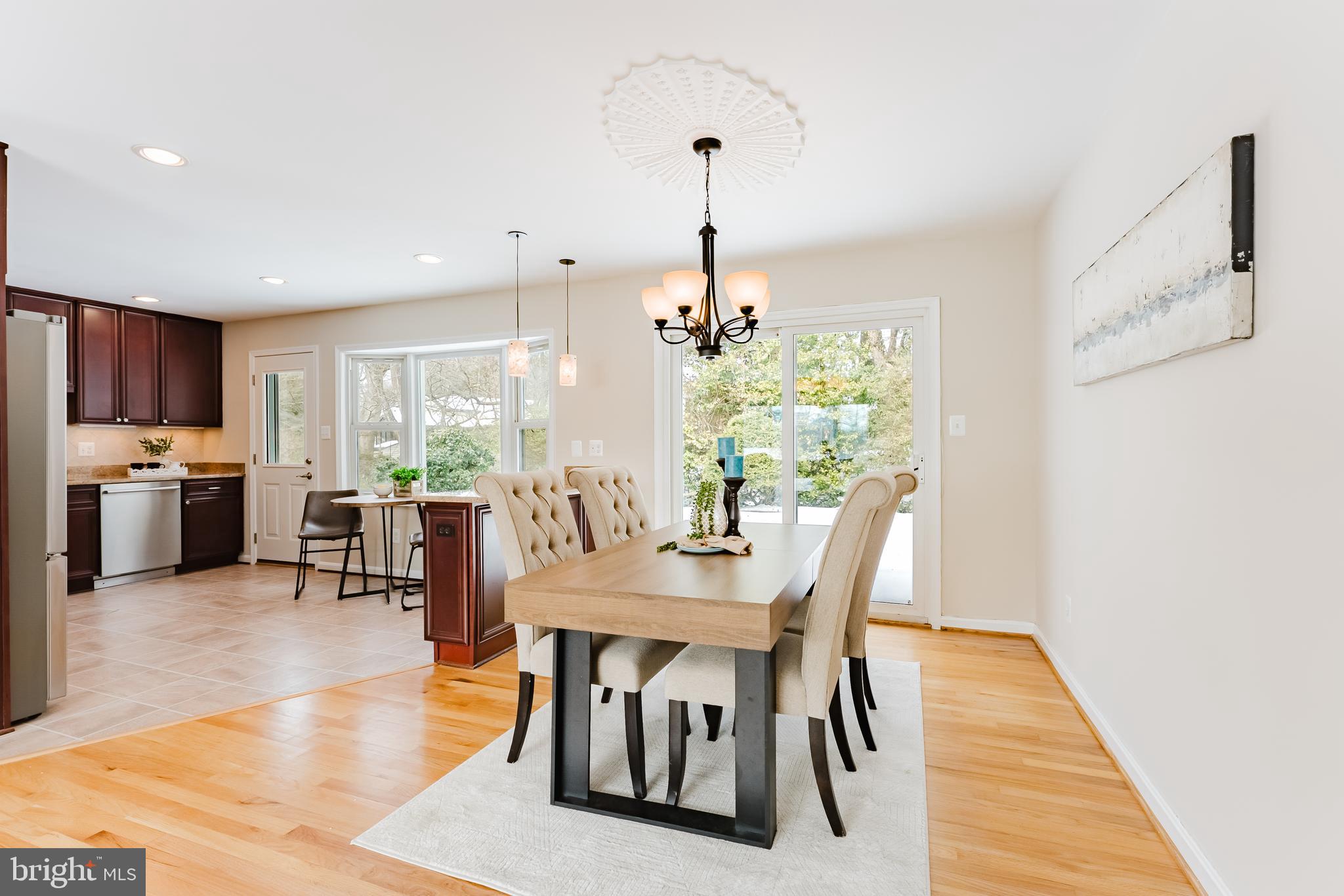 4704 Federal Court Annandale, VA 22003 - Photo 12 of 51 a view of a dining room with furniture window and wooden floor