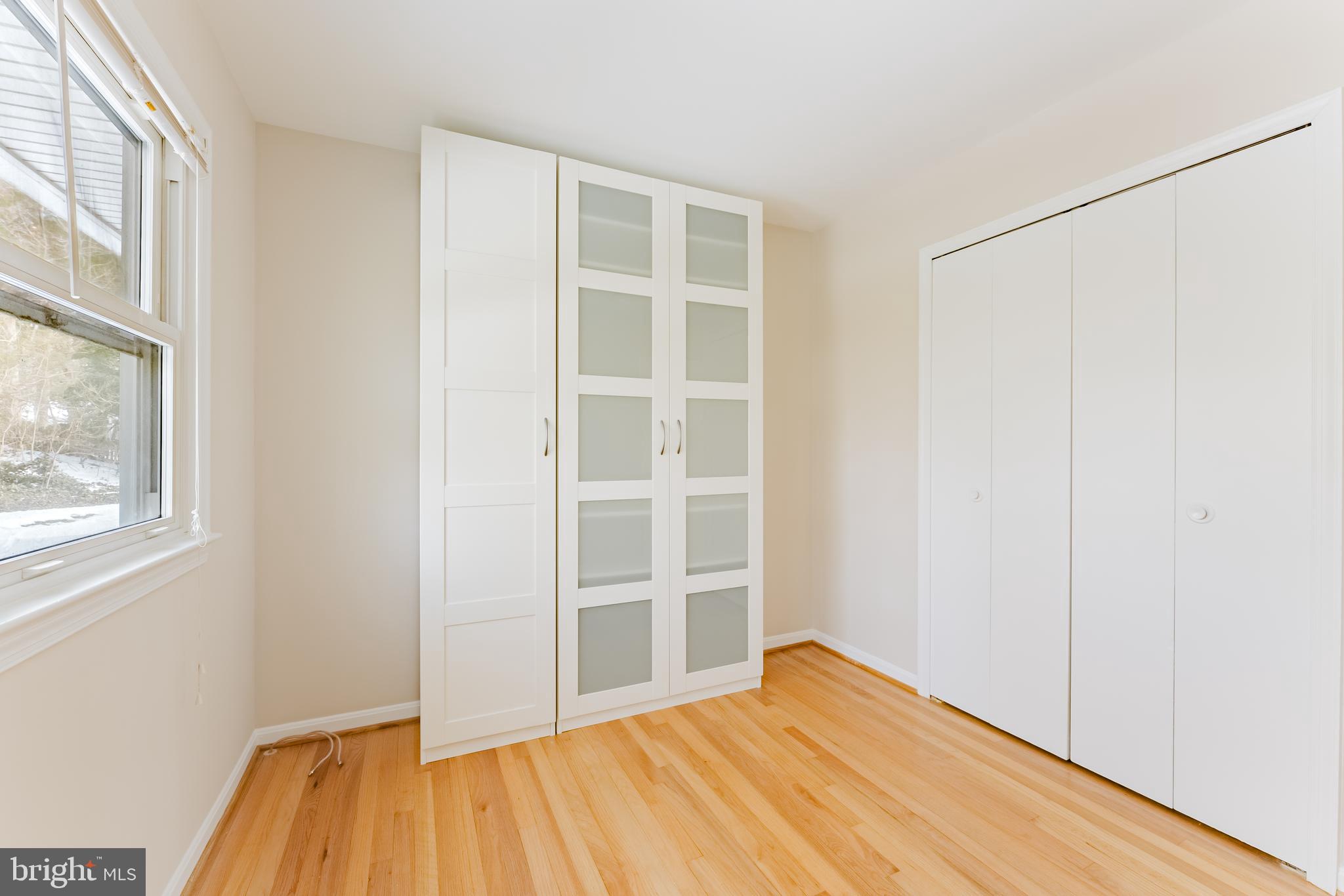 4704 Federal Court Annandale, VA 22003 - Photo 29 of 51 a bedroom with a bed and a window