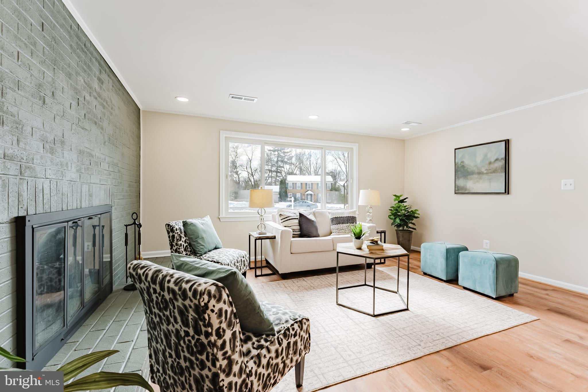 4704 Federal Court Annandale, VA 22003 - Photo 34 of 51 a living room with furniture and a fireplace