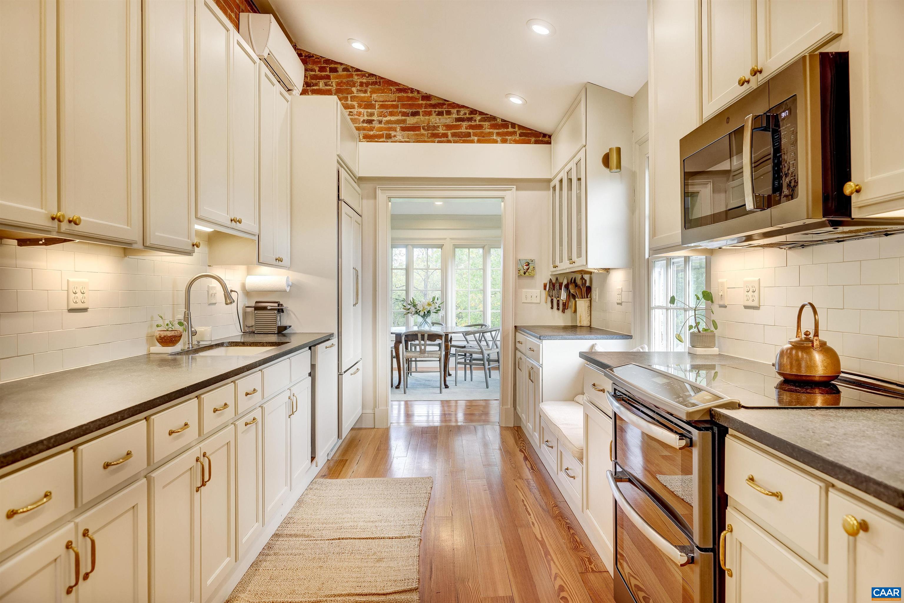 4710 Dickerson Road Earlysville, VA 22936 - Photo 18 of 75 a kitchen with sink stove and cabinets
