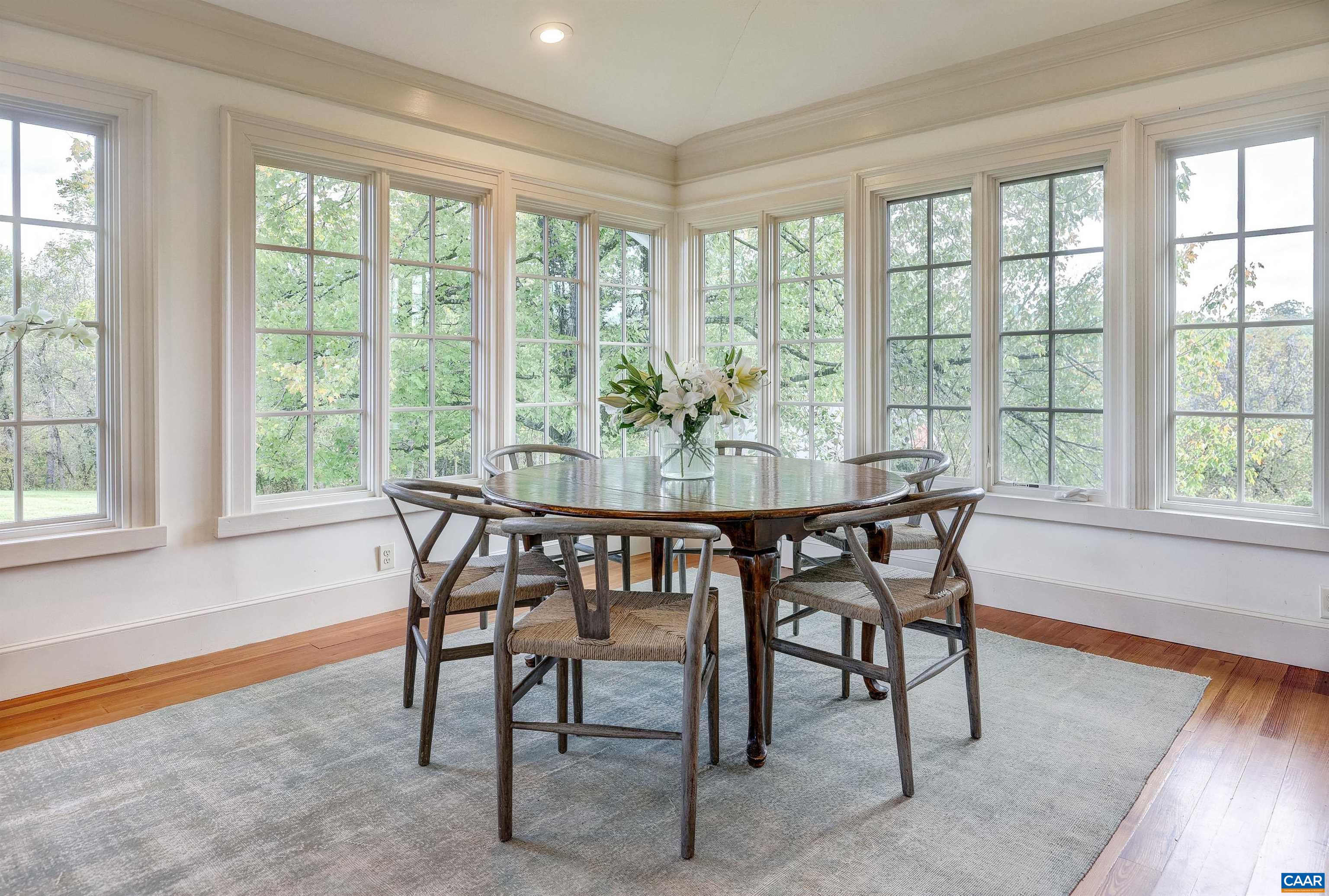 4710 Dickerson Road Earlysville, VA 22936 - Photo 21 of 75 a dining room with furniture and wooden floor