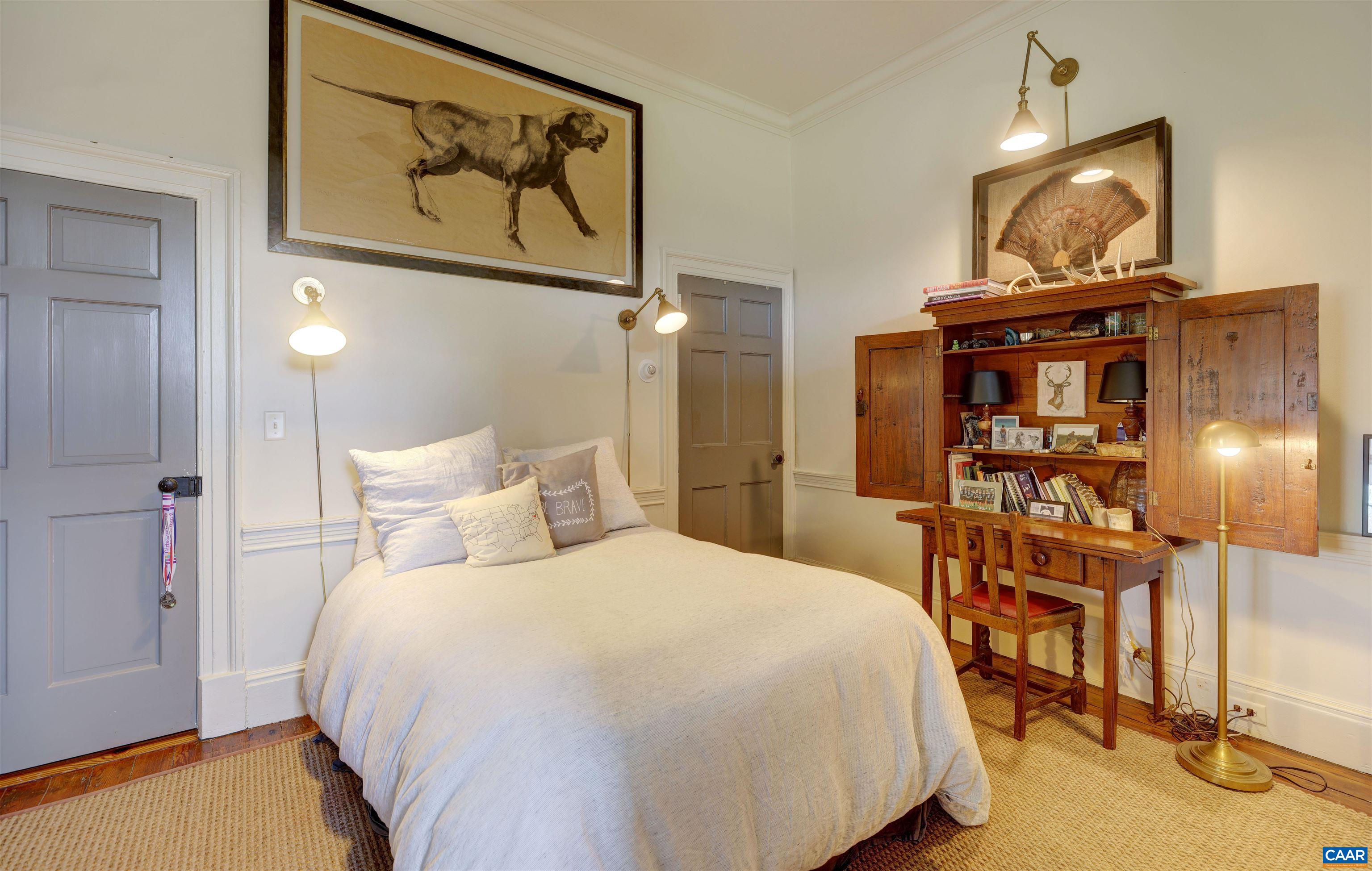 4710 Dickerson Road Earlysville, VA 22936 - Photo 26 of 75 a bedroom with a bed and wooden floor