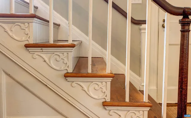 a spacious bedroom with a bed and a couch