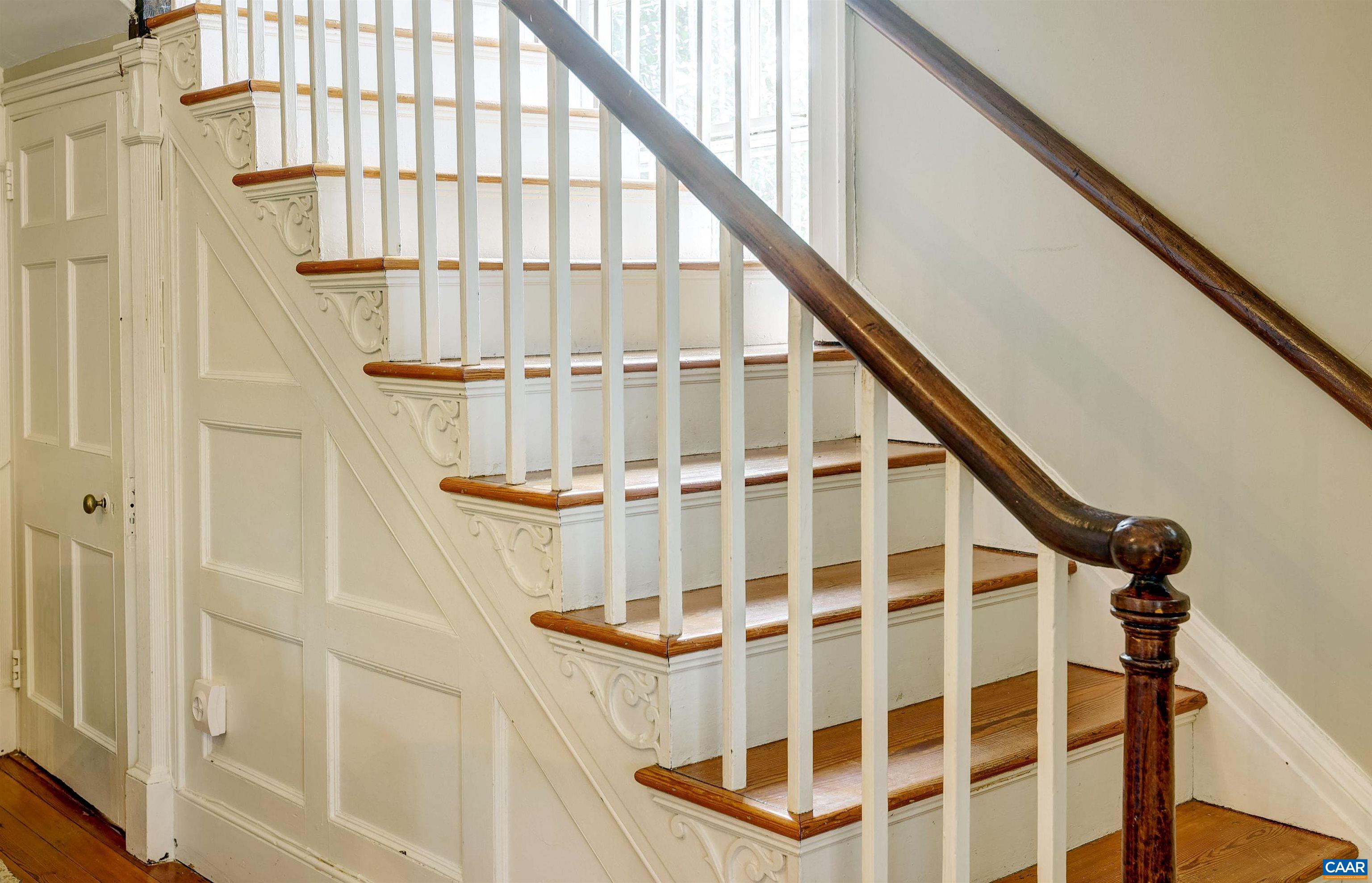 4710 Dickerson Road Earlysville, VA 22936 - Photo 34 of 75 a view of staircase with wooden floor and white walls