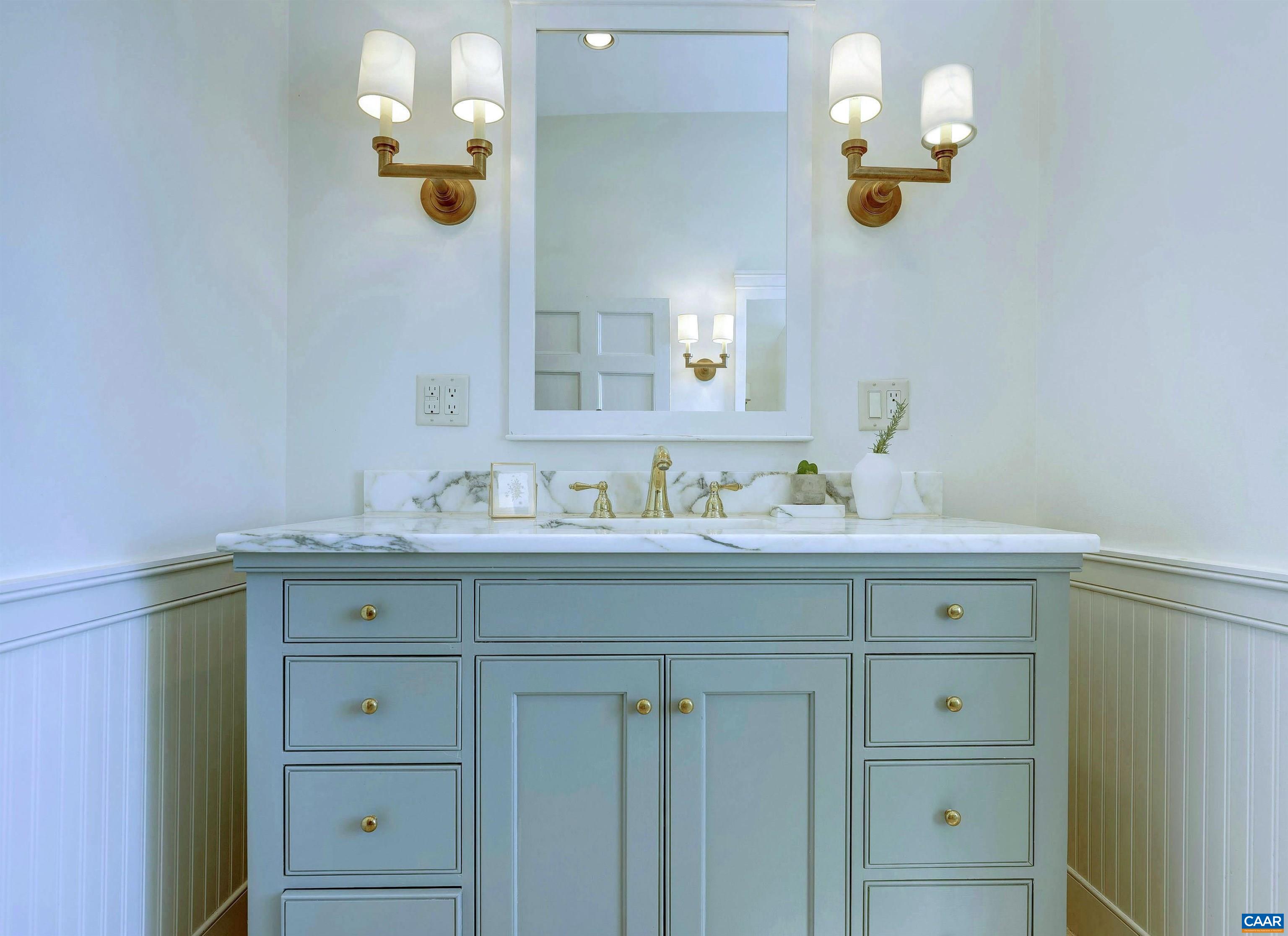 4710 Dickerson Road Earlysville, VA 22936 - Photo 40 of 75 a bathroom with a sink vanity and mirror