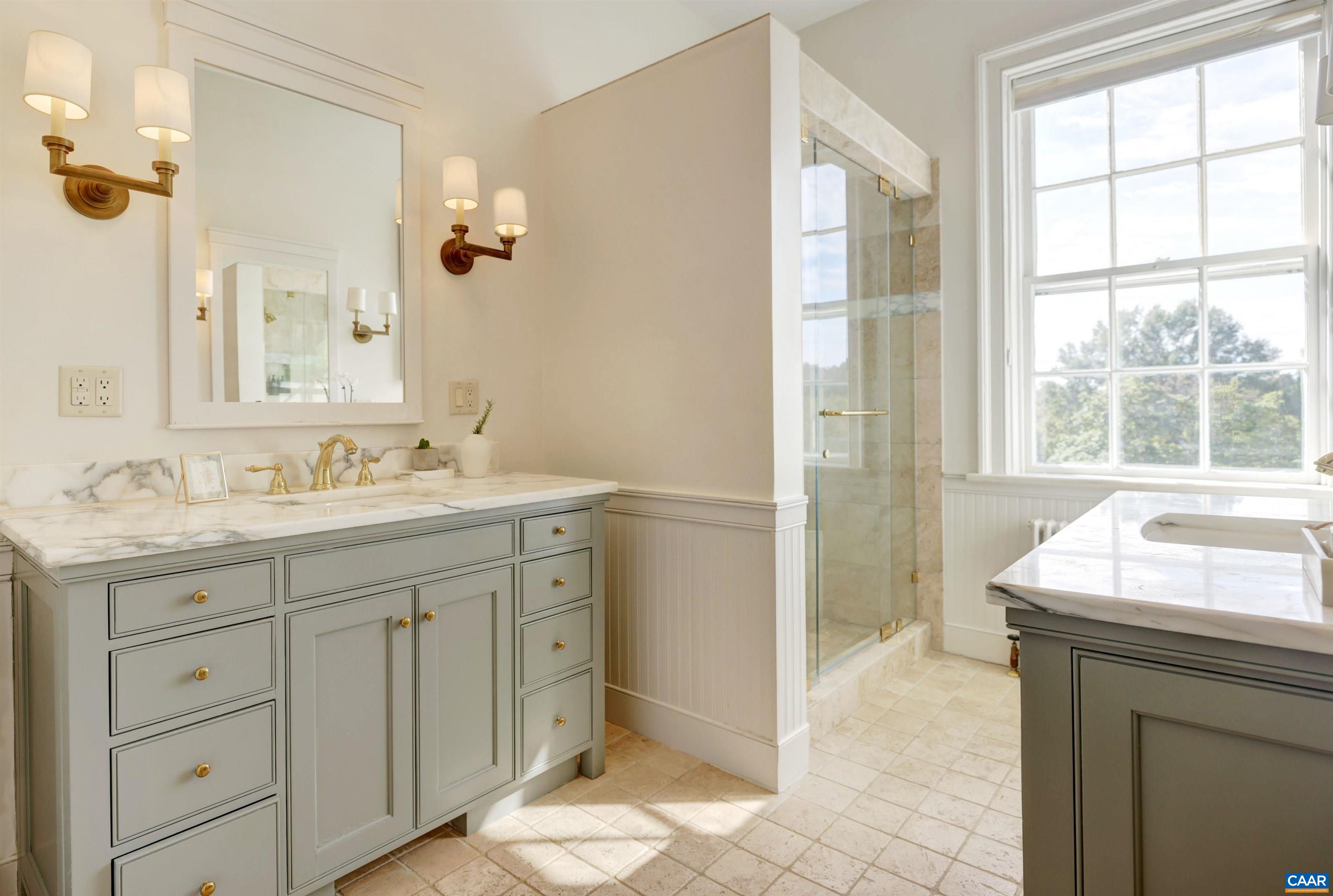4710 Dickerson Road Earlysville, VA 22936 - Photo 41 of 75 a bathroom with a sink a vanity and a mirror