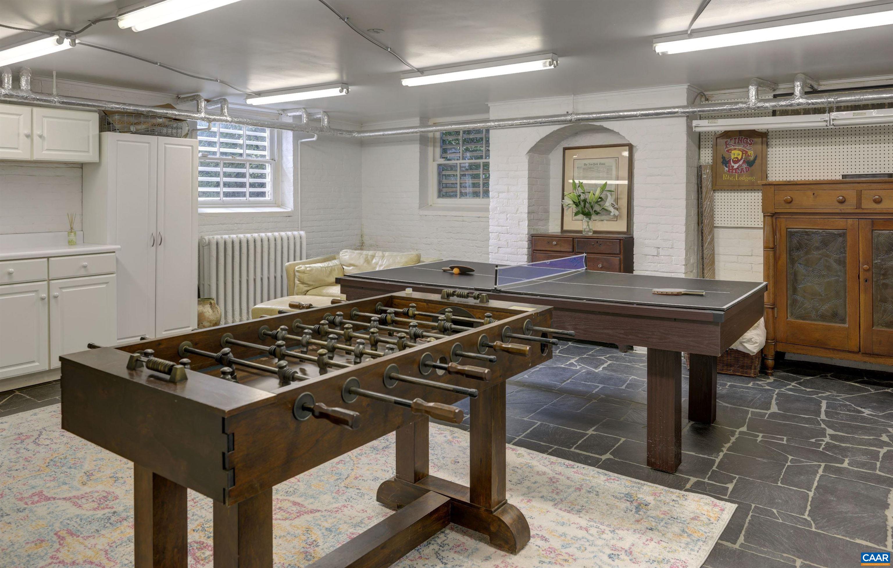 4710 Dickerson Road Earlysville, VA 22936 - Photo 50 of 75 a kitchen with a table chairs and a stove
