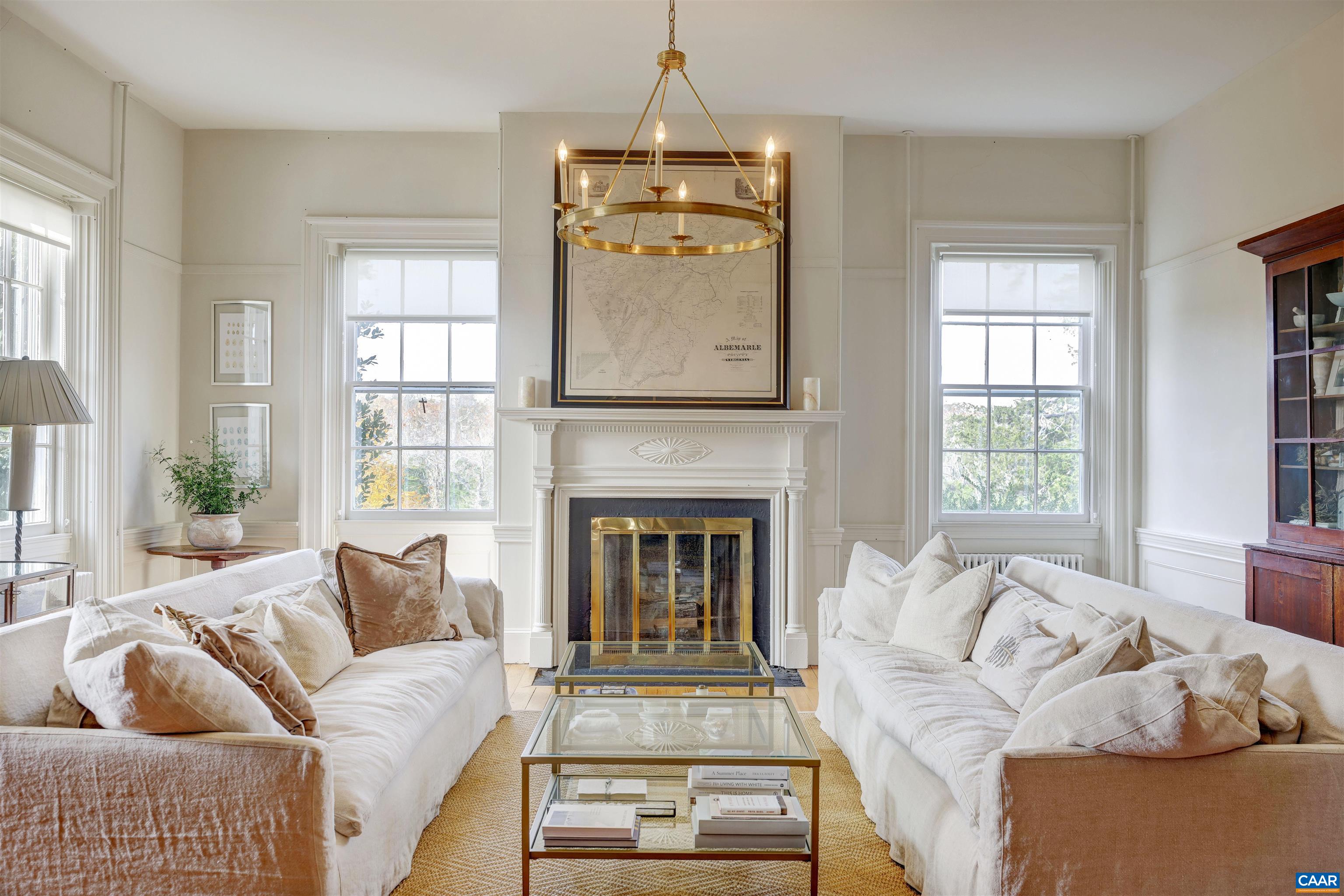 4710 Dickerson Road Earlysville, VA 22936 - Photo 6 of 75 a living room with furniture and a fireplace