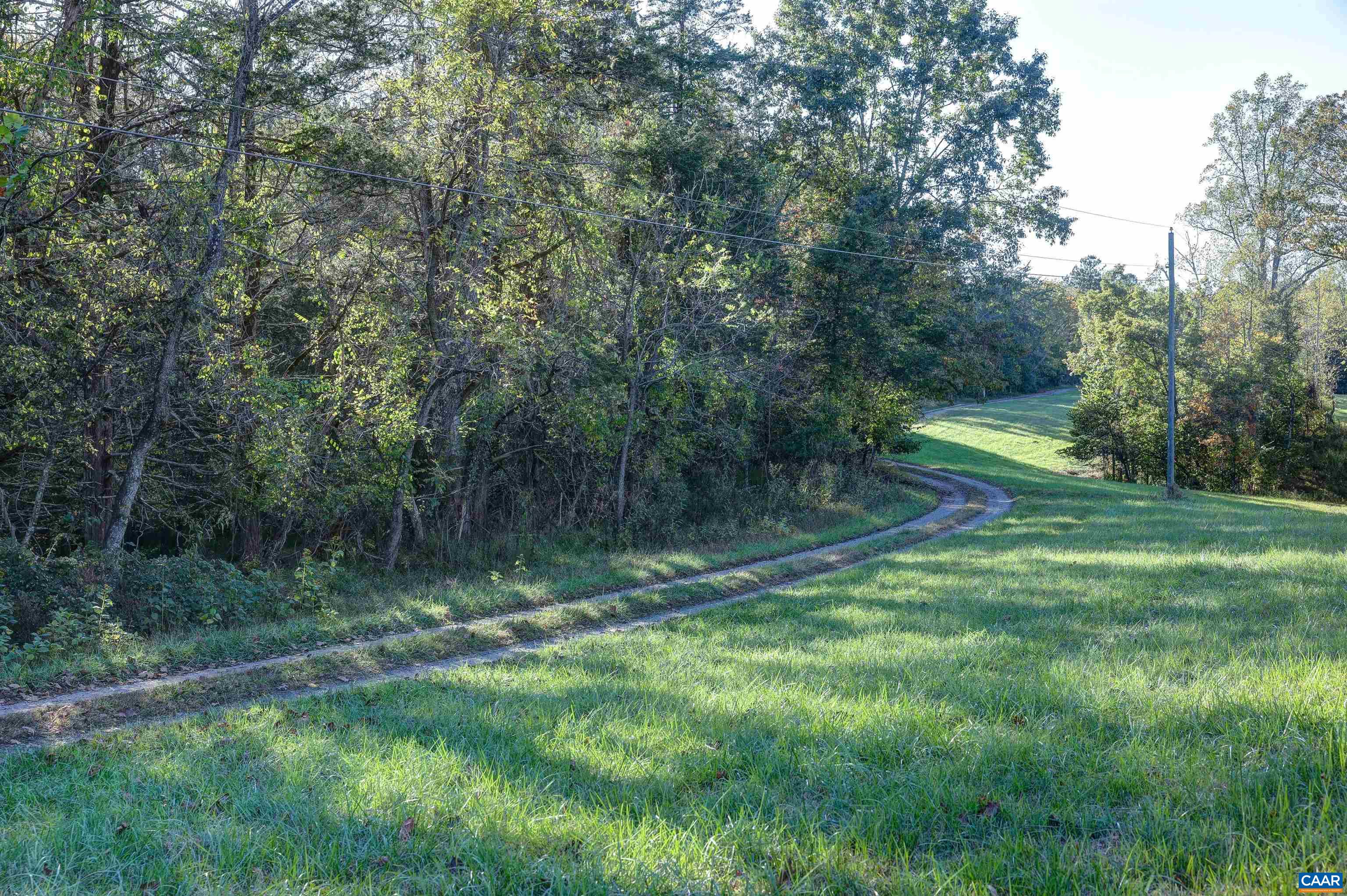 4710 Dickerson Road Earlysville, VA 22936 - Photo 70 of 75 a view of outdoor space with deck and yard