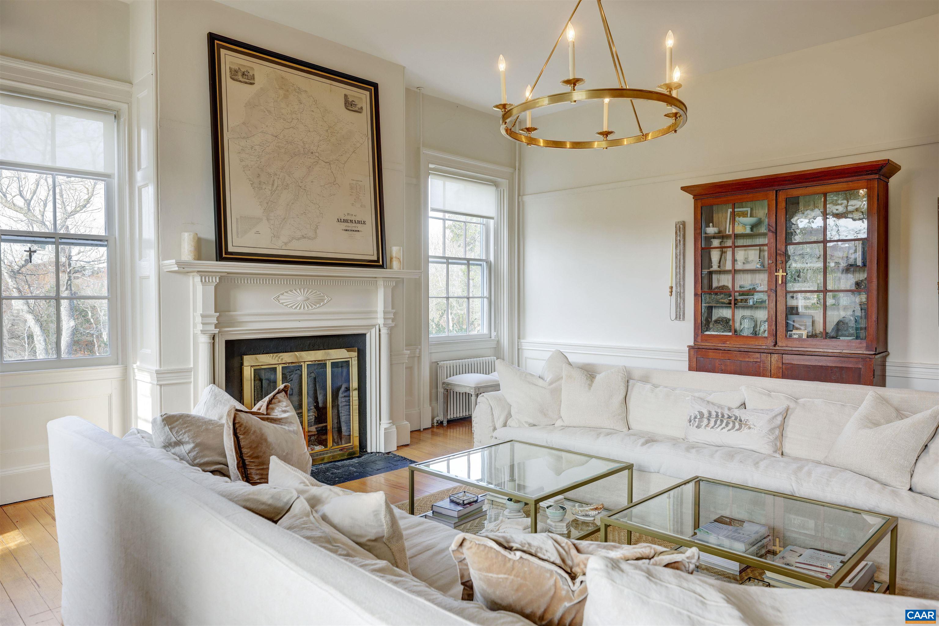 4710 Dickerson Road Earlysville, VA 22936 - Photo 8 of 75 a living room with patio furniture and a fireplace