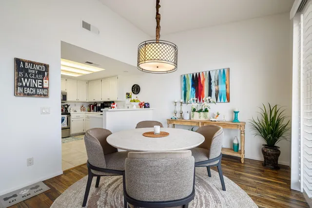 a bedroom with a bed and a table