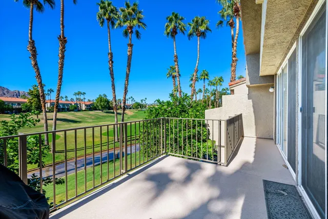 a view of a house with a potted plant