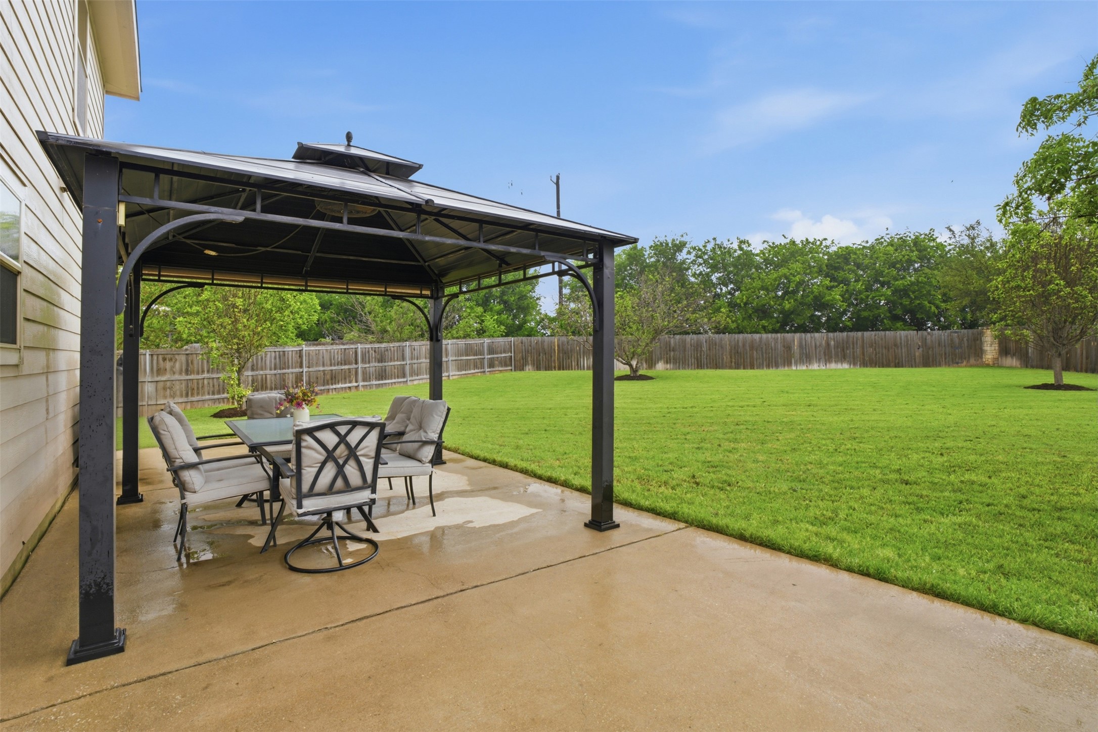 137 Barn Owl Loop Leander, TX 78641 - Photo 32 of 36 a view of an outdoor sitting area