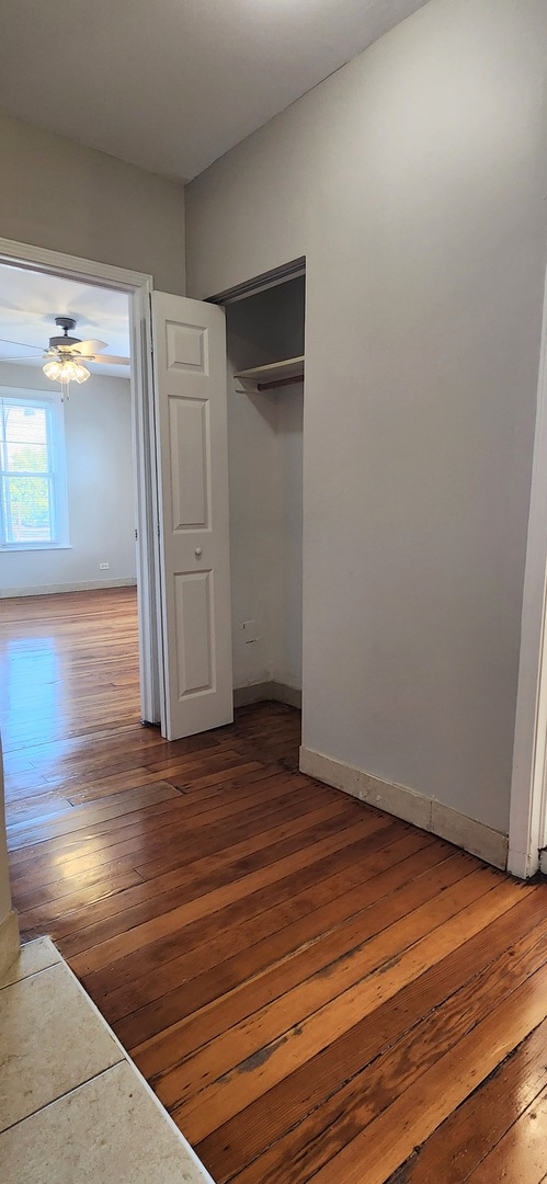 4764 North Virginia Avenue, Unit 206 Chicago, IL 60625 - Photo 14 of 16 a view of empty room with wooden floor
