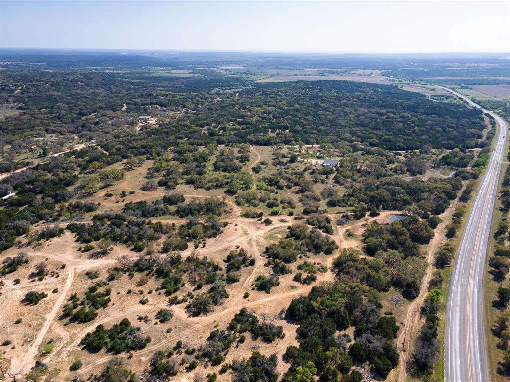 402 County Road 402 Goldthwaite, TX 76844 - Photo 17 of 40 an aerial view of house with yard and mountain view in back