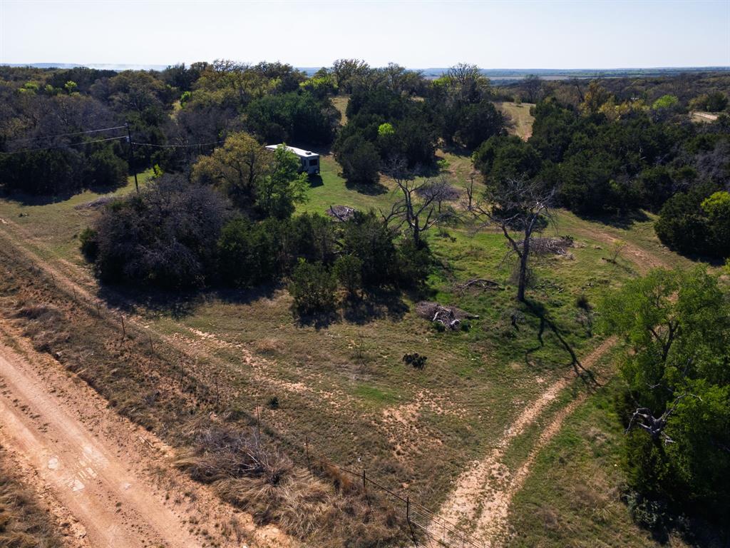 402 County Road 402 Goldthwaite, TX 76844 - Photo 24 of 40 a view of a street with a forest